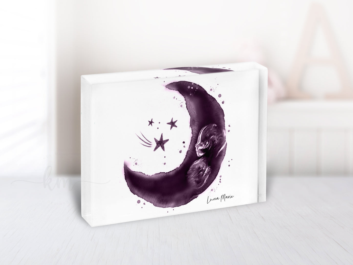 Moon and stars ultrasound art displayed as nursery wall decor