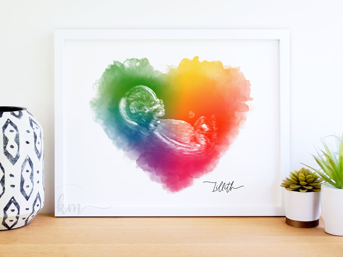 Framed rainbow heart ultrasound keepsake shown on a shelf – baby loss or miscarriage gift
