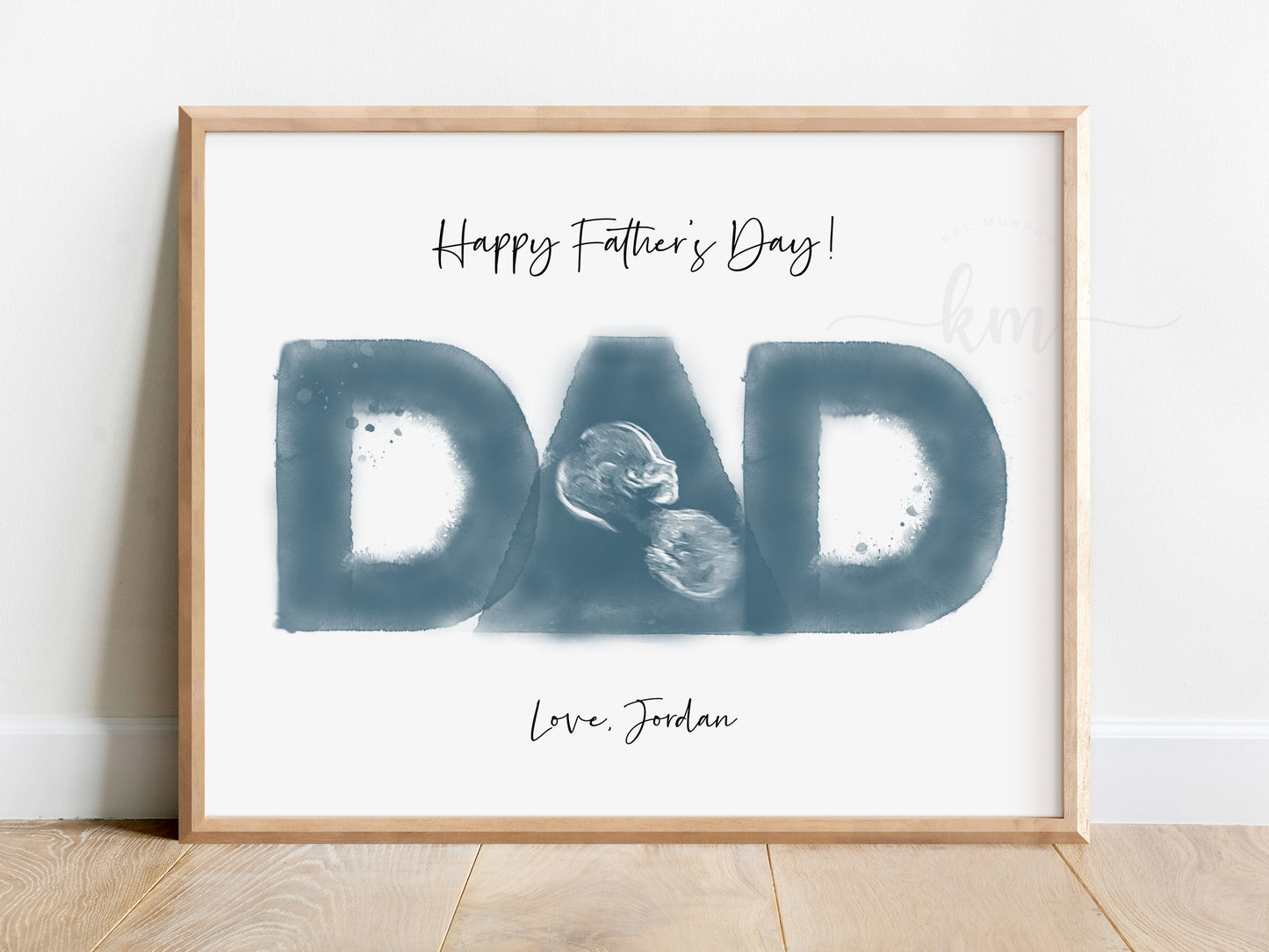 Custom ultrasound art with baby's image inside the word Dad