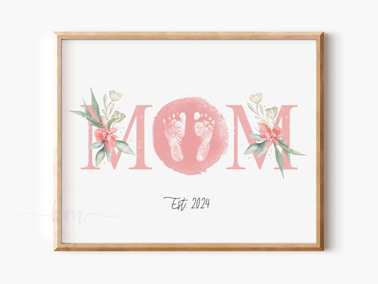 Baby footprint art with the word Mom, created as a Mother’s Day or new mom gift

