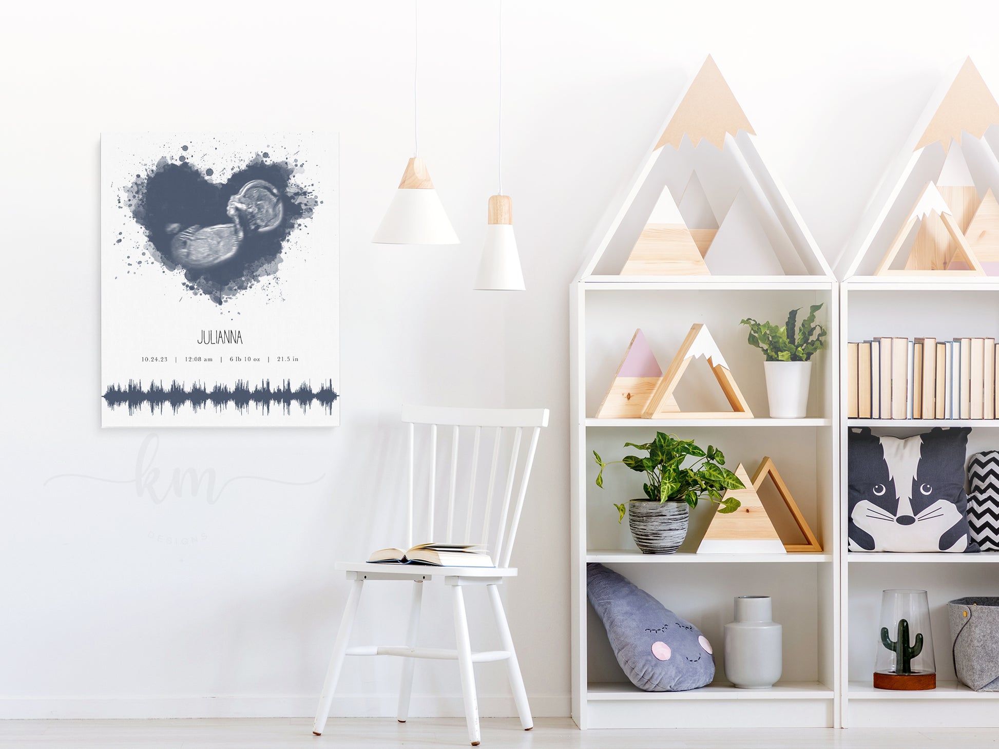 Ultrasound and heartbeat keepsake displayed in nursery with personalization options

