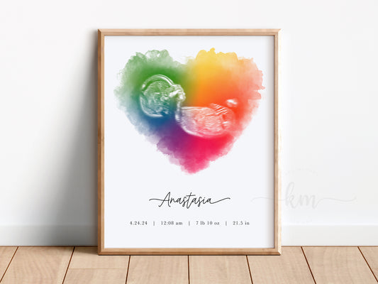 Rainbow baby ultrasound art featuring watercolor heart design

